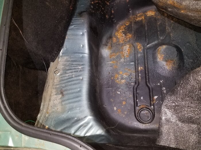 Trunk Floor surface rust only.jpg
